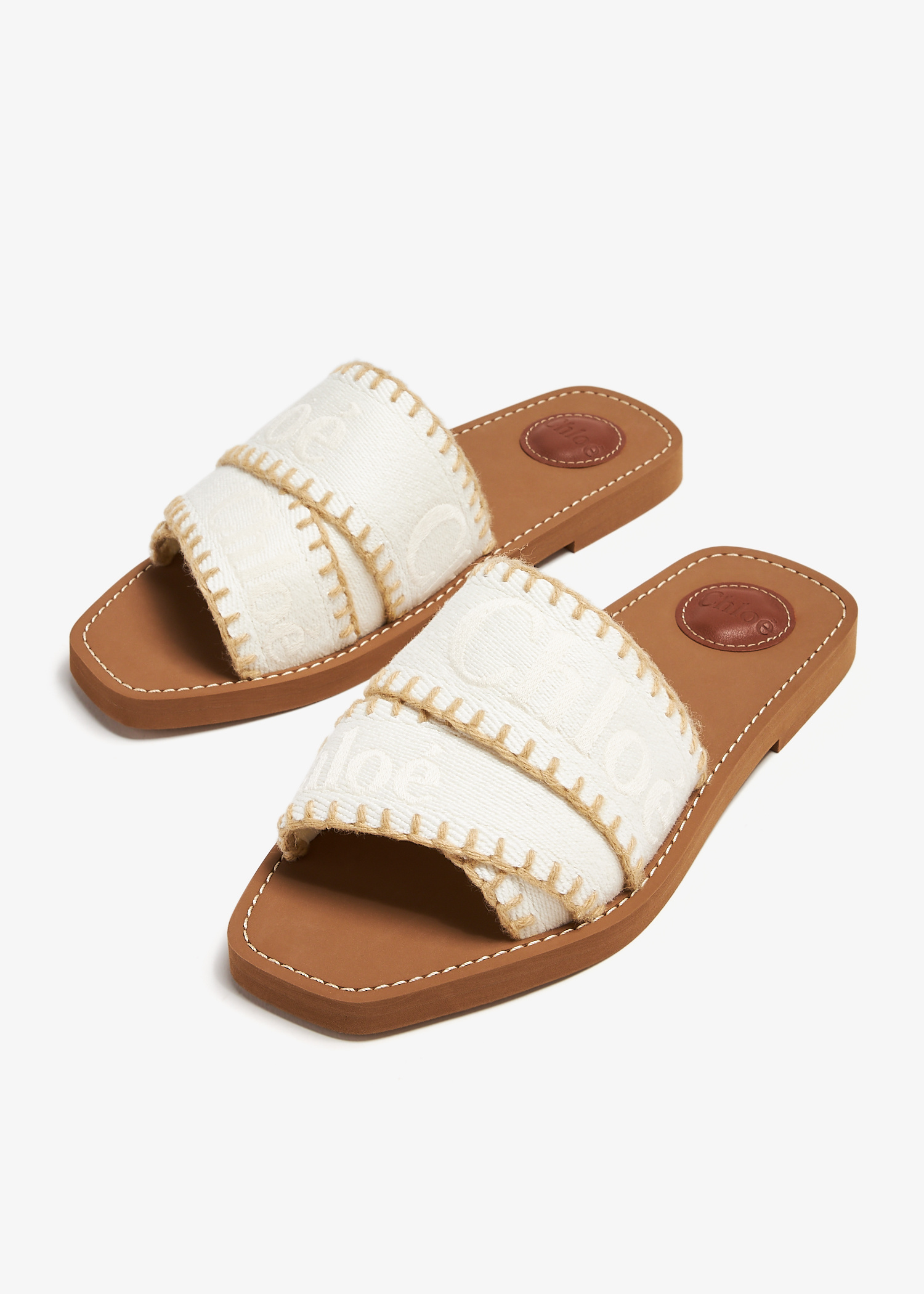 Chloe ウッティフラットミュル CHC24U02JAL 117 Chloé Woody flat sandals for Women - White in USA | Level Shoes