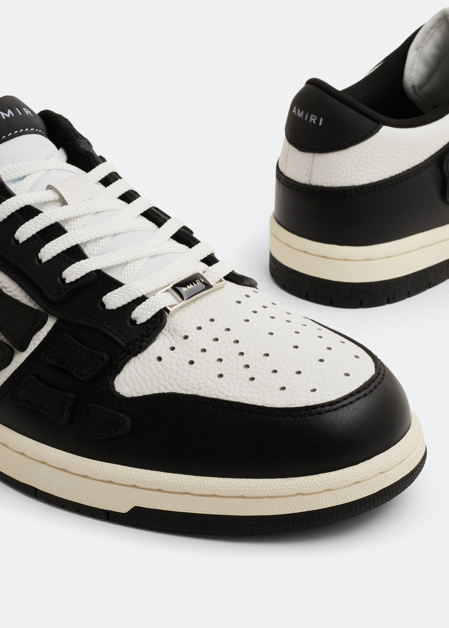 AMIRI Skel low-top sneakers for Men - White in UAE | Level Shoes