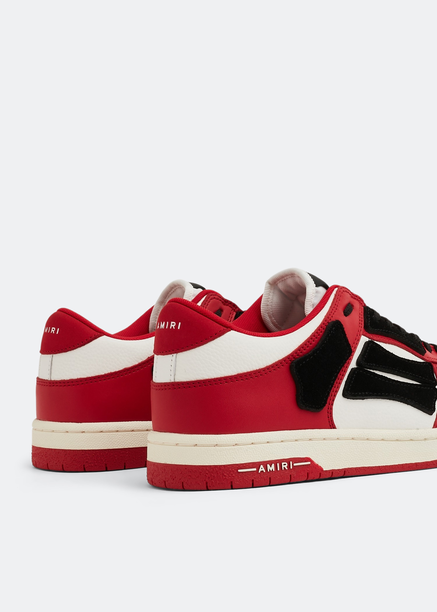 AMIRI Skel low-top sneakers for Men - Red in UAE | Level Shoes