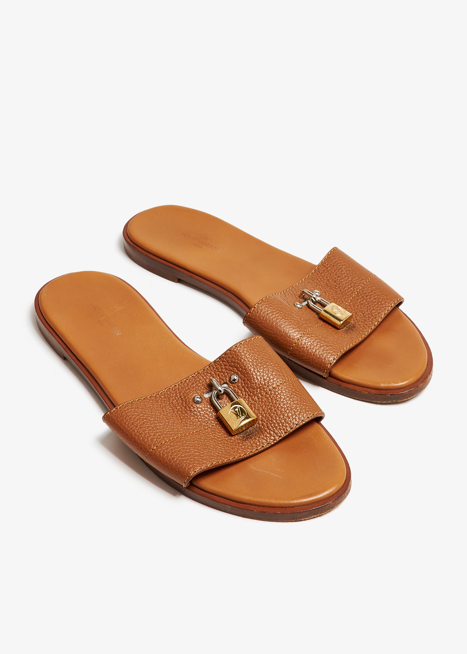 Louis Vuitton Pre-Loved Lock It flat sandals for Women