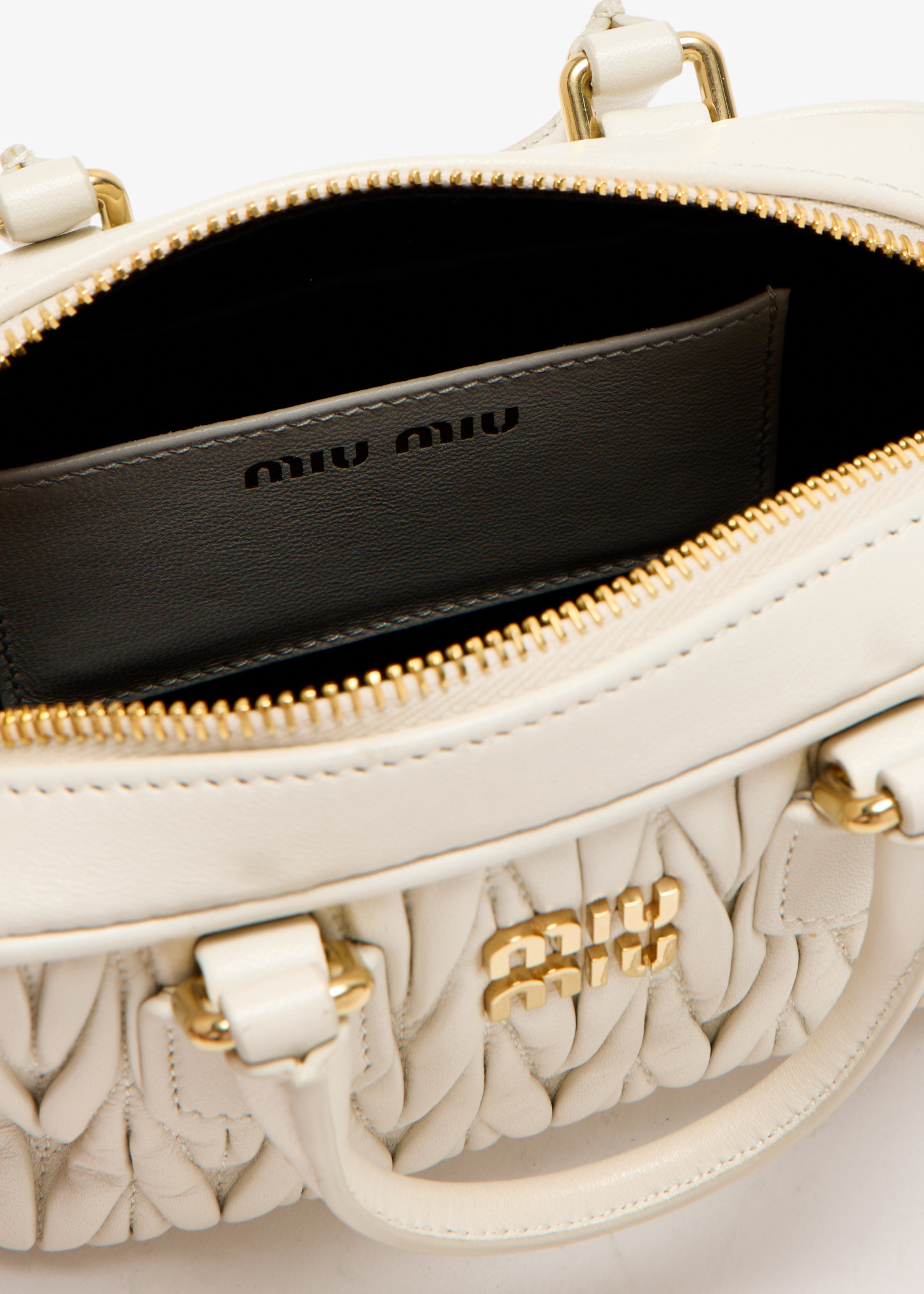 Miu Miu Pre-Loved Matelassé leather top handle bag for Women