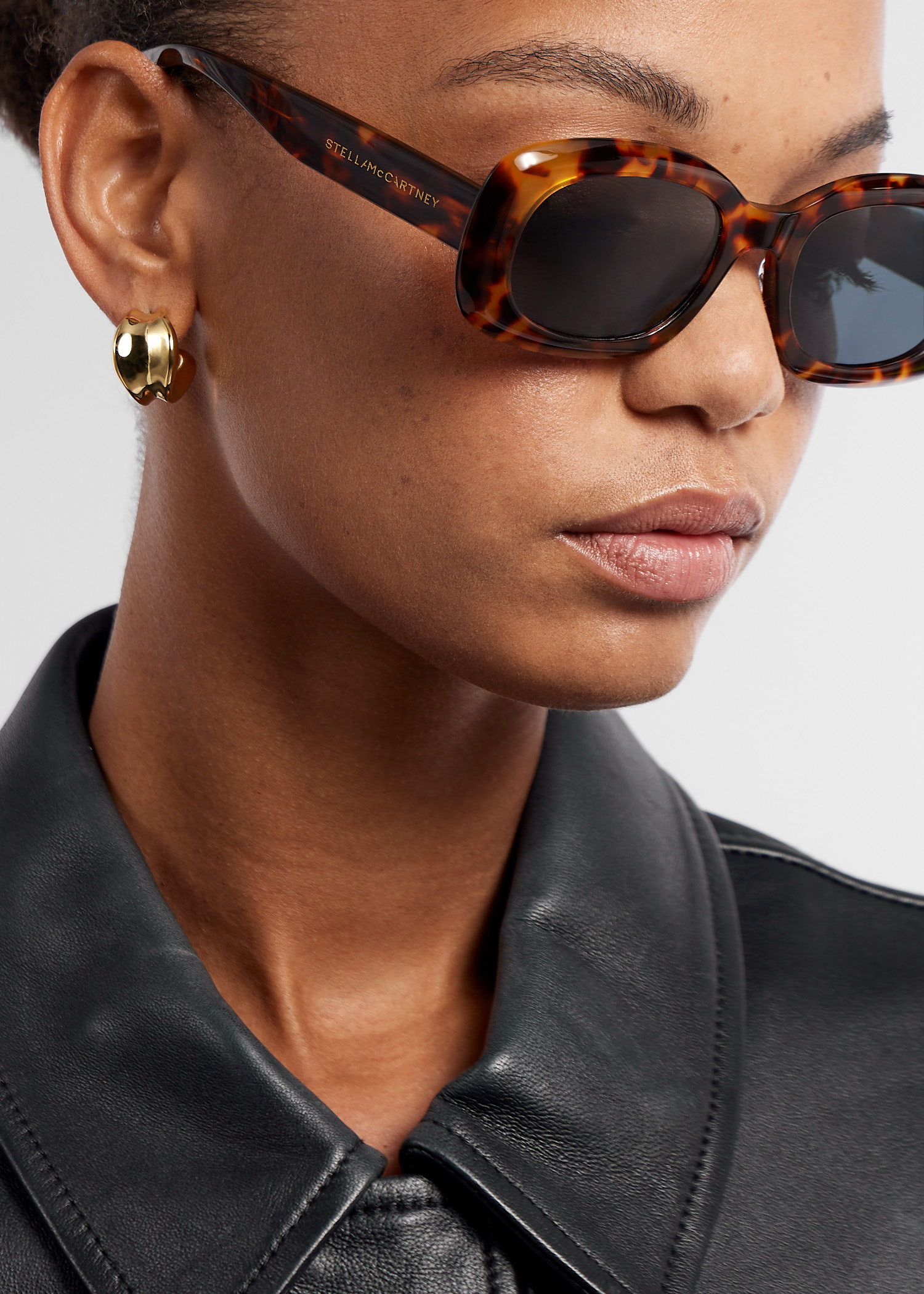 Stella McCartney Medallion oval sunglasses for Women - Brown