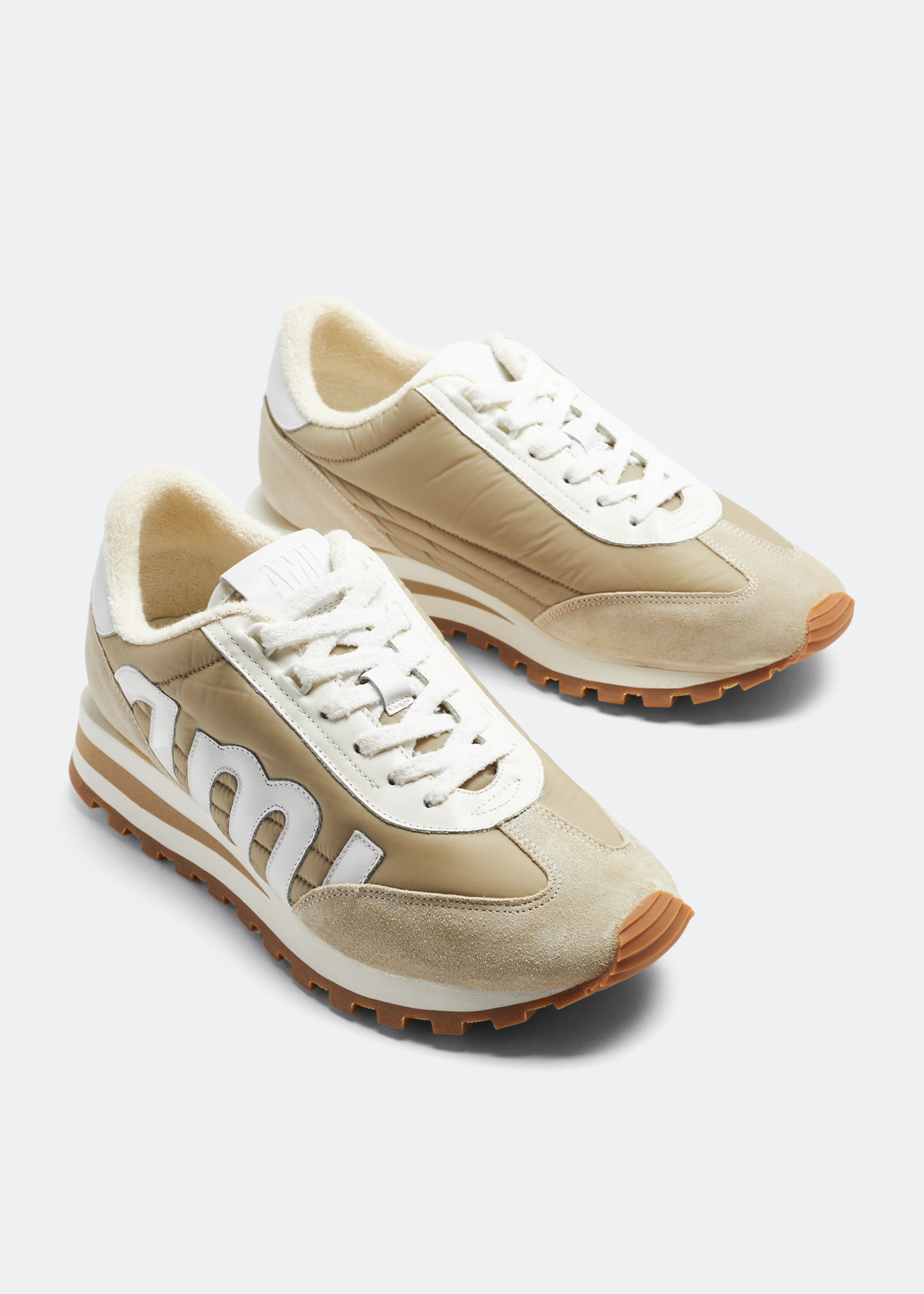Ami Ami Rush sneakers for Men - Beige in USA | Level Shoes