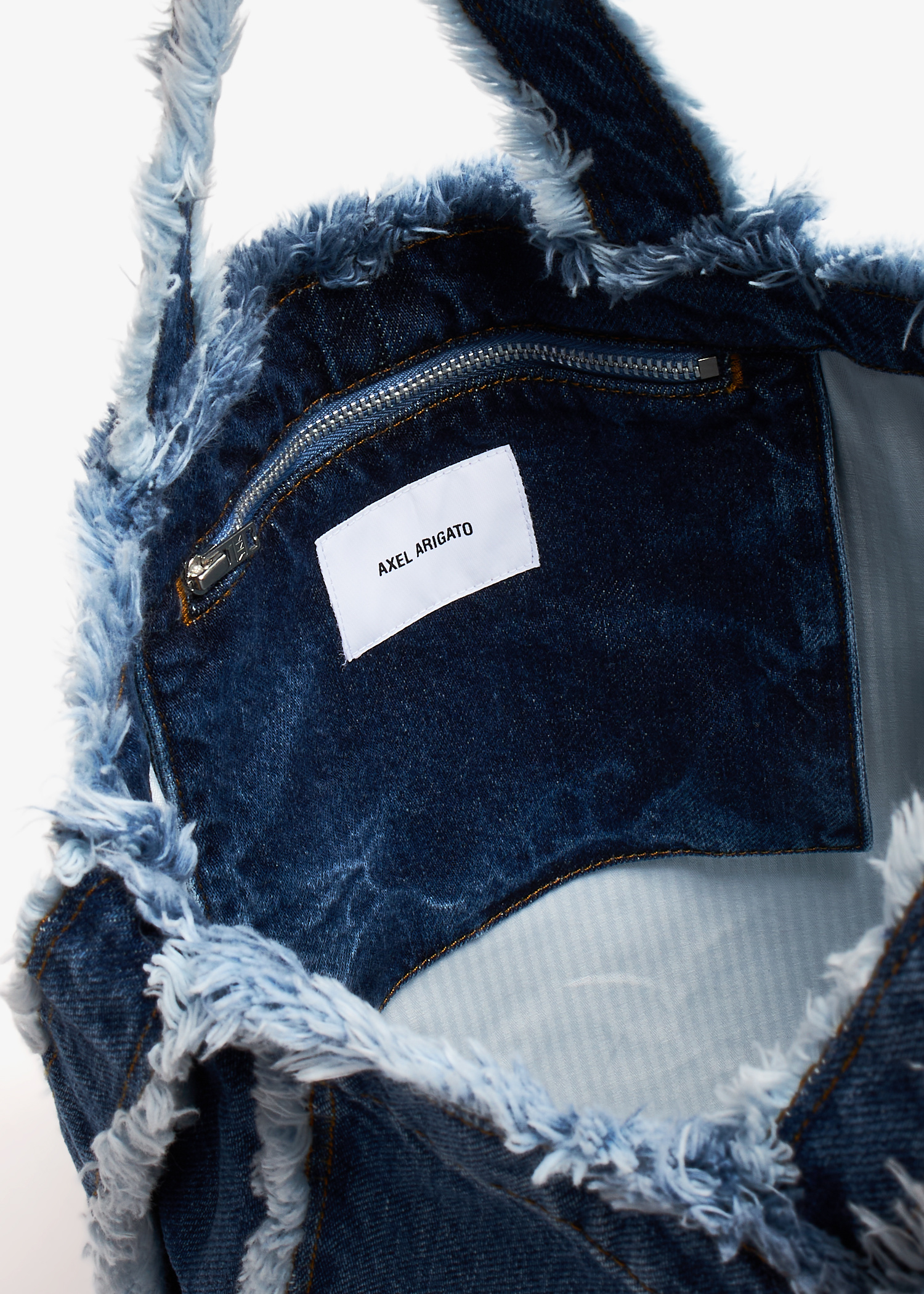 Axel Arigato Dune frayed denim bag for Women - Blue in UAE