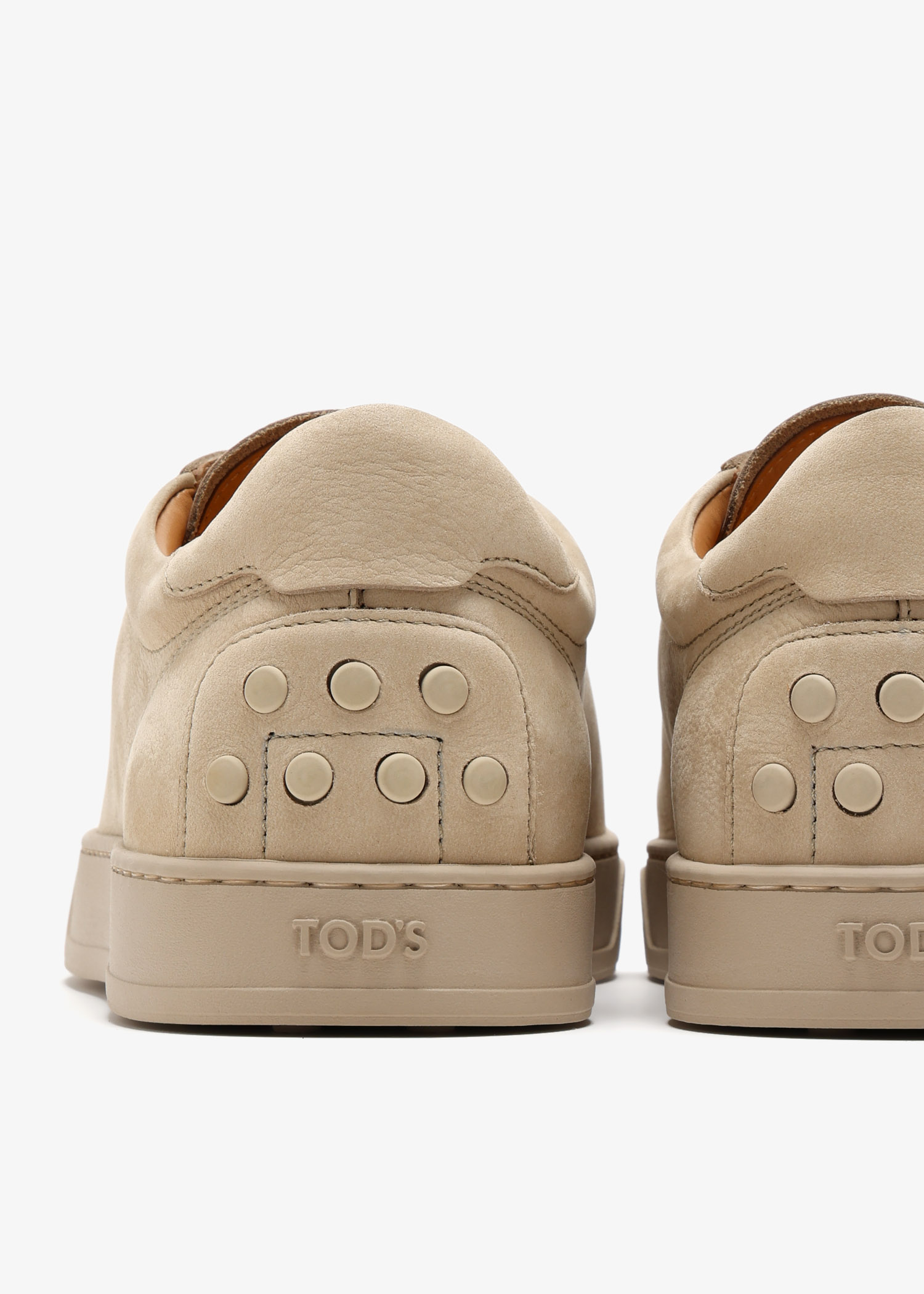 Tod's Nubuck leather sneakers for Men - Beige in UAE | Level