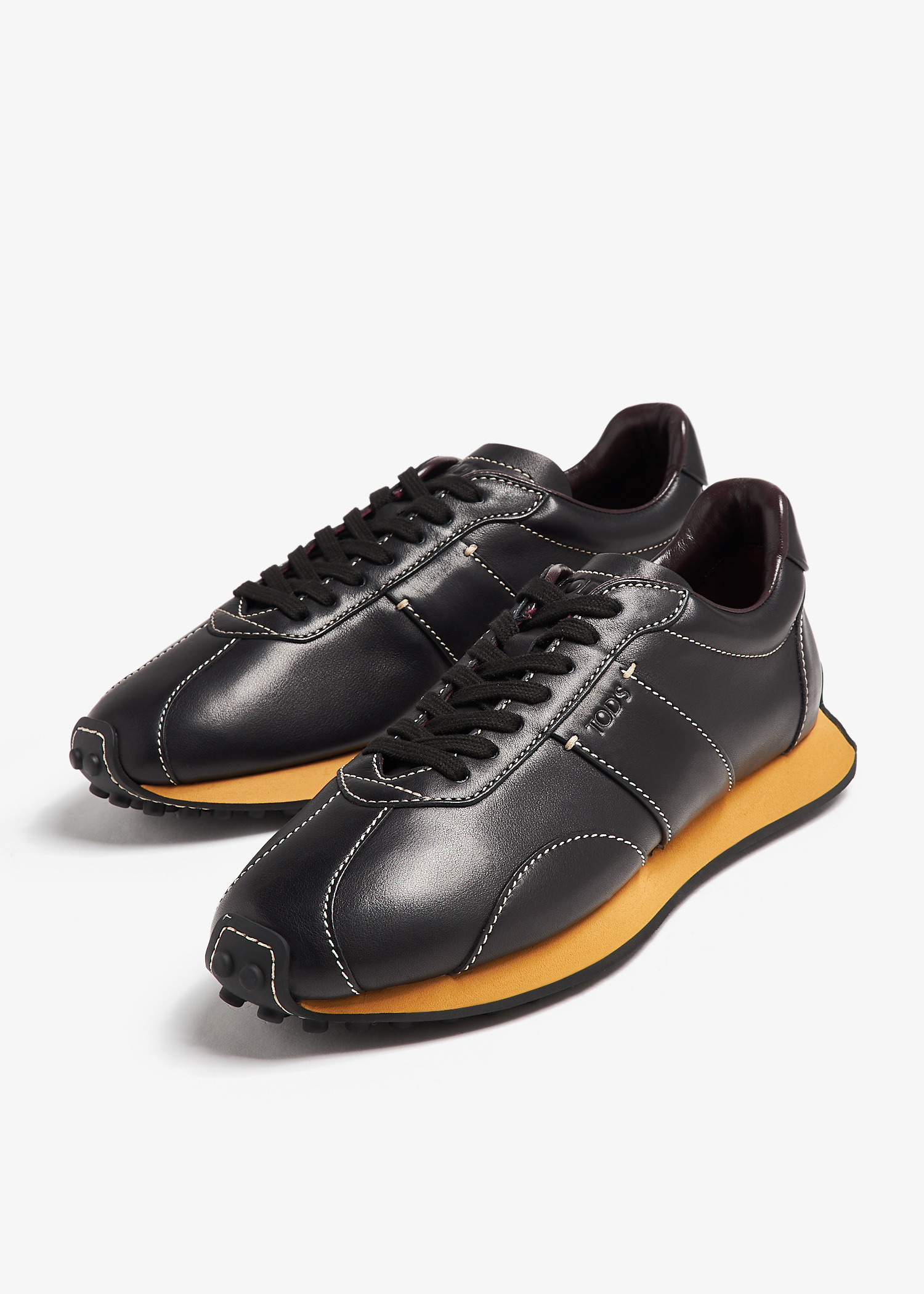 Tod's T Vintage sneakers for Men - Black in USA | Level Shoes