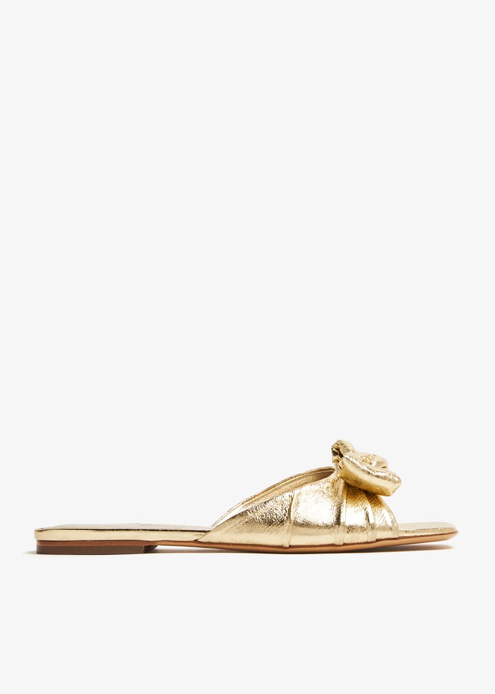 Ferragamo Padded Vara bow slide sandals for Women - Gold in