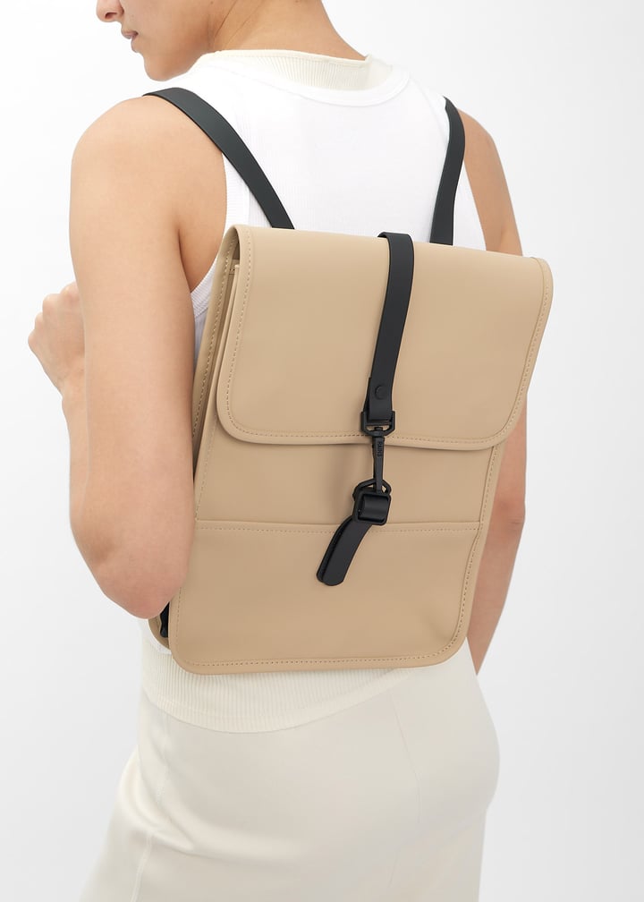 rains micro backpack W3 It includes various compartments such as a padded laptop compartment Backpack Micro