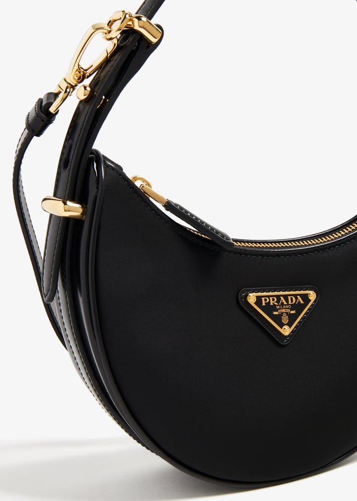 関税込 PRADA Black Re-Nylon and leather ArquA handbag Prada Arqué Re-Nylon and brushed leather mini shoulder bag