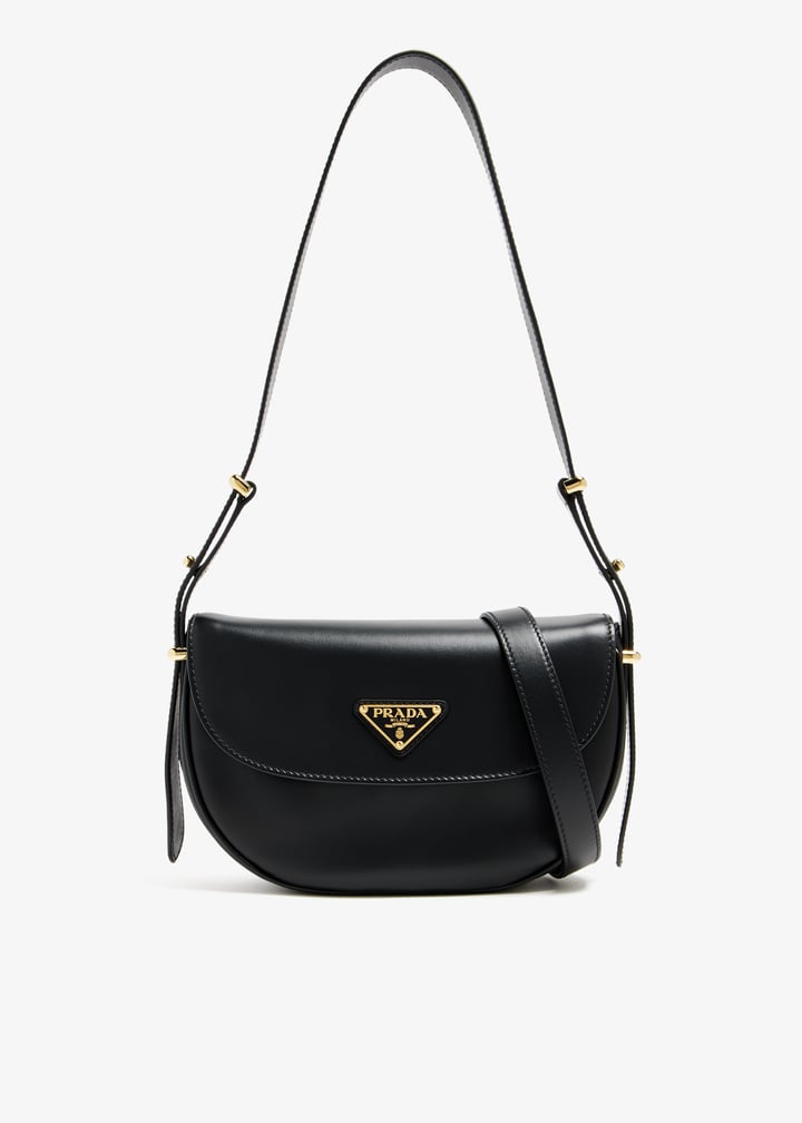 Prada Arqué leather flap shoulder bag for Women - Black in