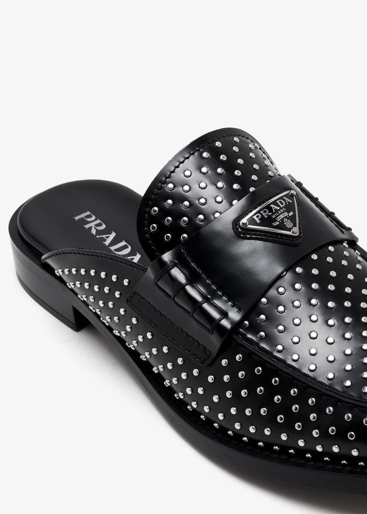 Prada Studded brushed leather mules for Women - Black in UAE