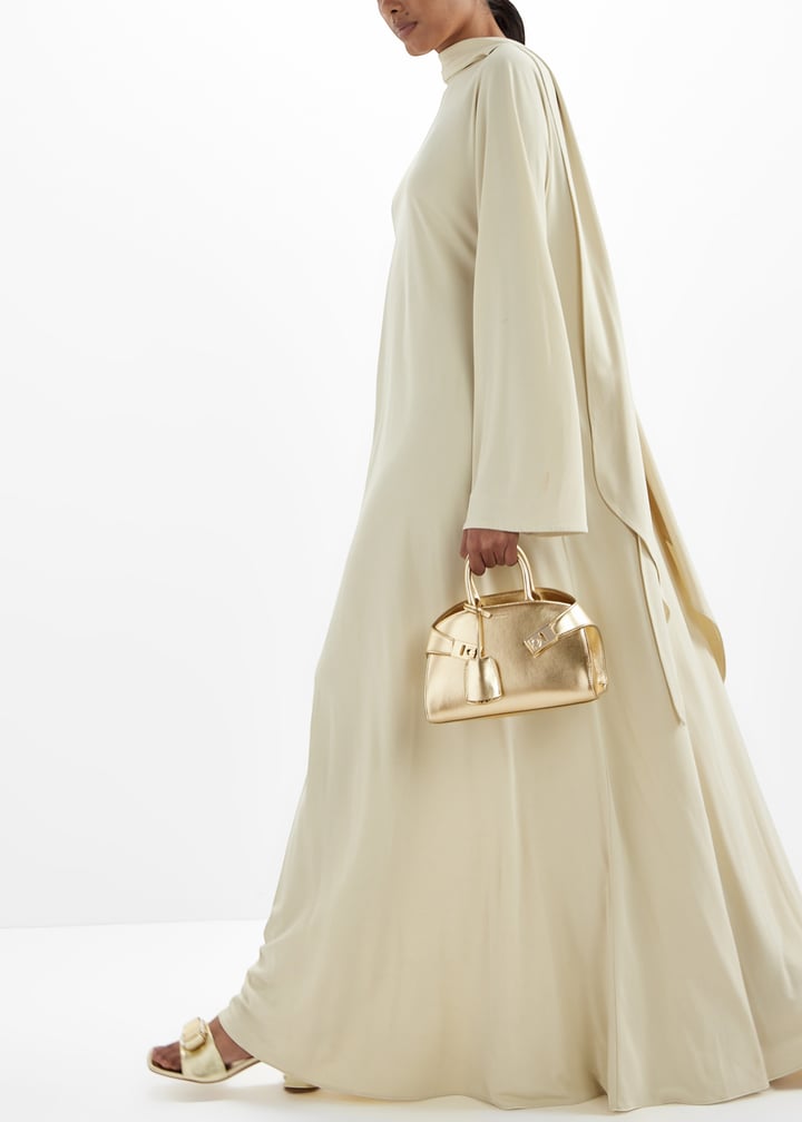 Ferragamo Hug mini bag for Women - Gold in UAE | Level Shoes