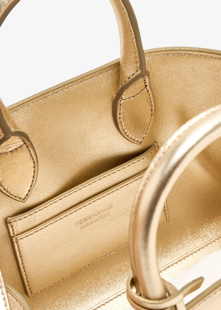 【送料&関税込】Ferragamo Gold Hug Mini Bag Ferragamo Hug mini bag for Women - Gold in UAE | Level Shoes
