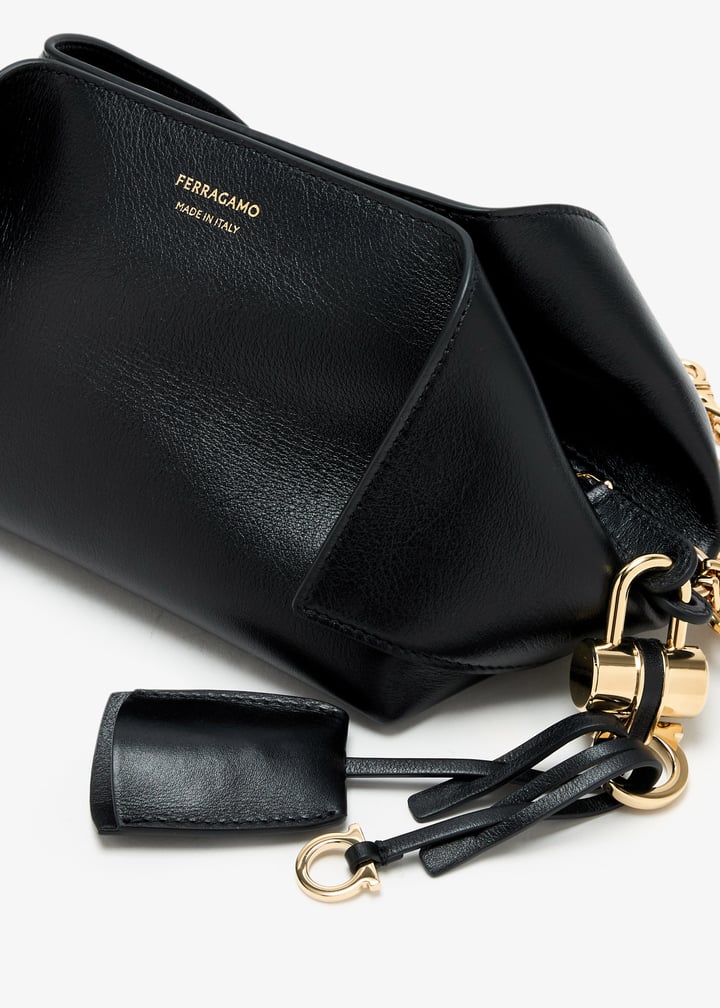 Ferragamo Leather clutch for Women - Black in UAE | Level Shoes