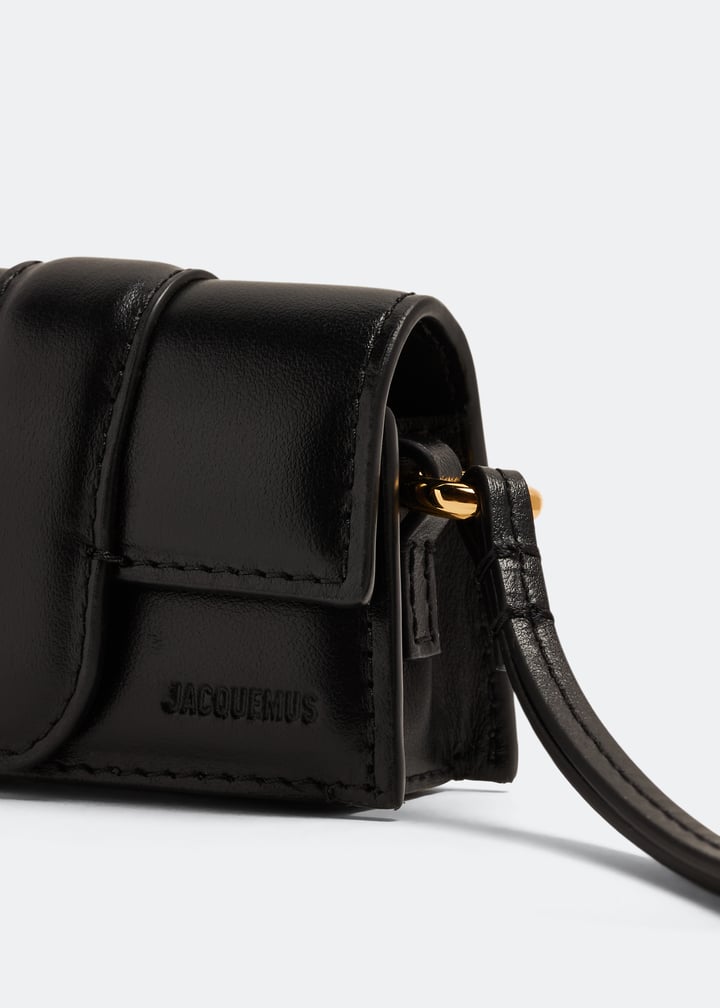 スマホケース・テックアクセサリーその他 JACQUEMUS 'Le porte Bambino' AirPods case Black Le Porte Bambino AirPods case in black - Jacquemus | Mytheresa