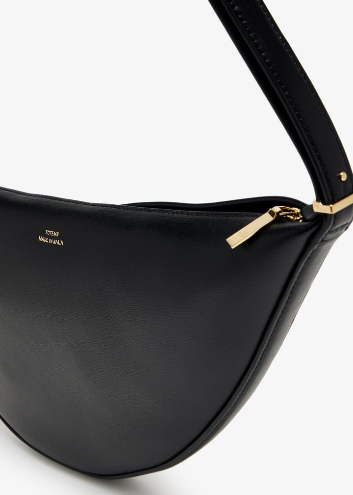 TOTEME Scooped sling bag for Women - Black in USA | Level Shoes