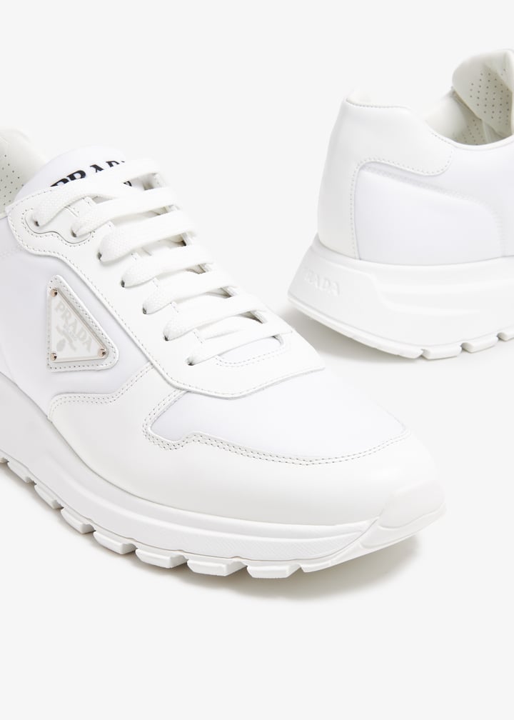 Prada Re-Nylon and brushed leather sneakers for Men - White