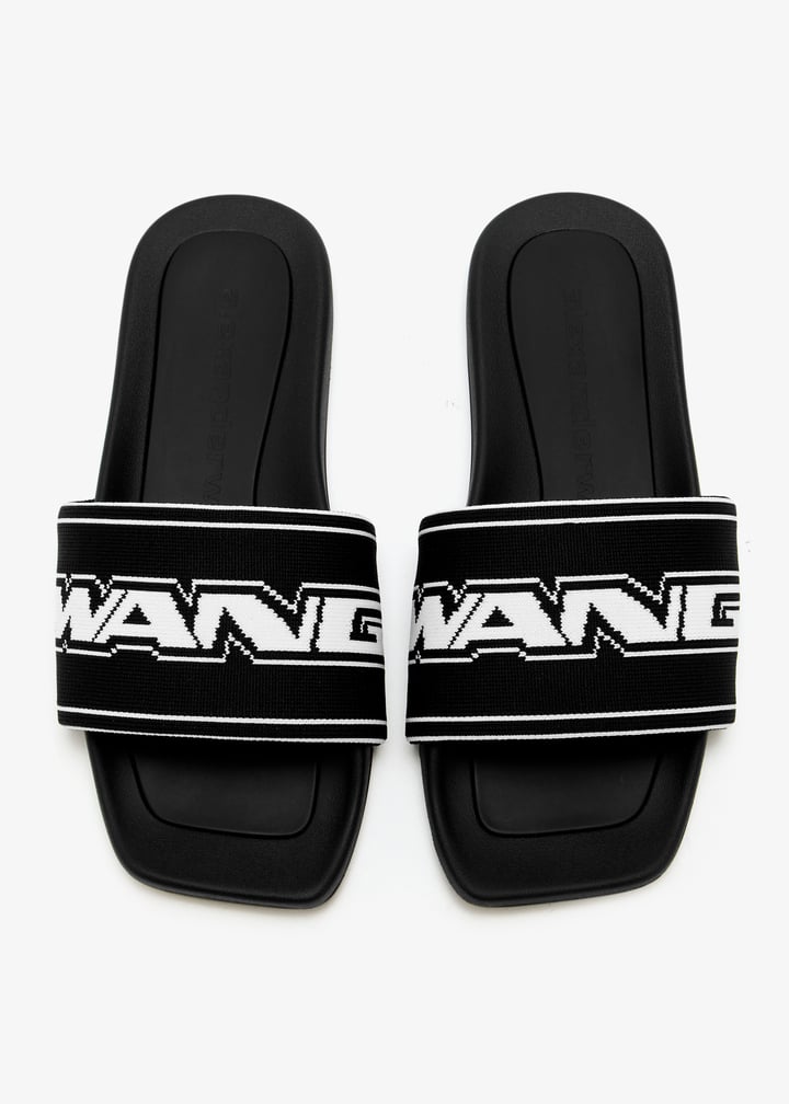 【送料&関税込】Alexander Wang Logo Slide Sandals Alexander Wang AW Logo Platform Slides | Saks Fifth Avenue