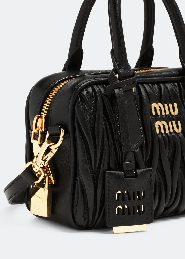 Miu Miu Matelassé leather top handle bag for Women - Black
