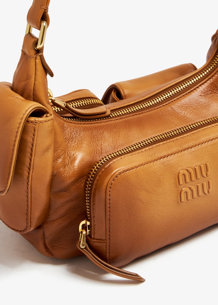 Miu Miu Leather Pocket bag for Women - Brown in UAE | Level Shoes