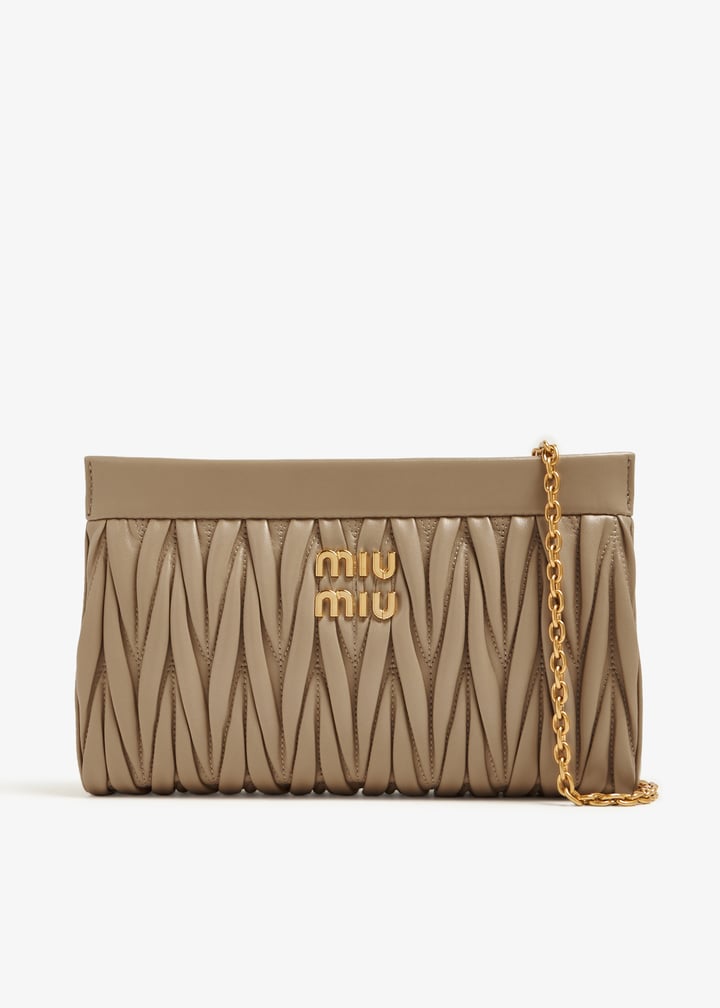 【MIU MIU】QUILTED NAPPA CLUTCH Miu Miu Matelassé Nappa Clutch Bag | Black | FARFETCH