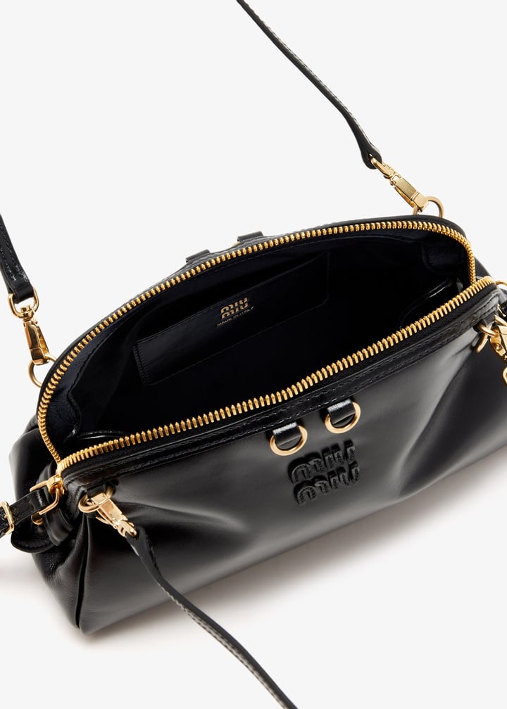 Miu Miu Caprice leather clutch for Women - Black in UAE | Level Shoes