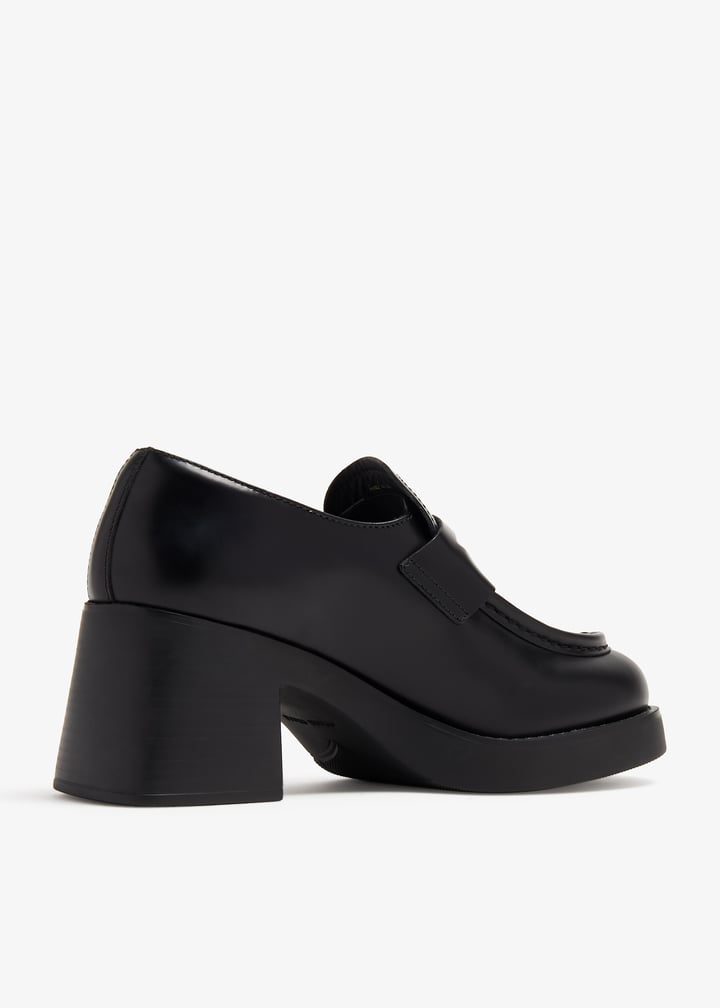 Miu Miu Leather penny loafers for Women - Black in UAE | Level Shoes