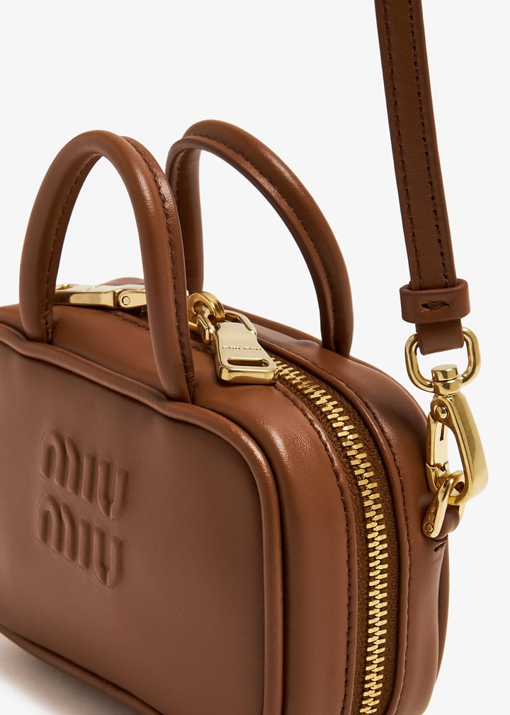 Miu Miu Leather micro bag for Women - Brown in UAE | Level Shoes