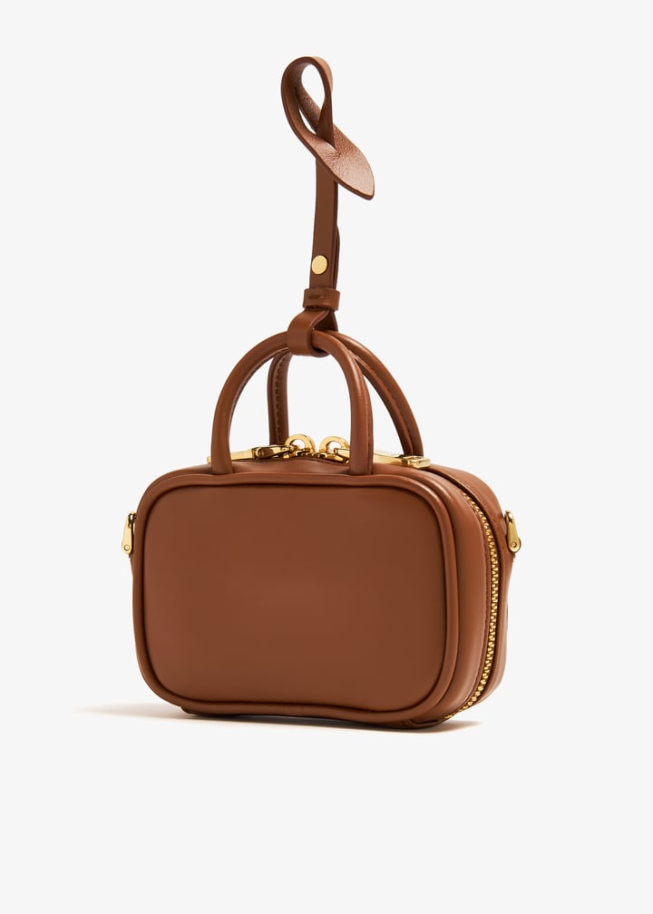 Miu Miu Leather micro bag for Women - Brown in UAE | Level Shoes