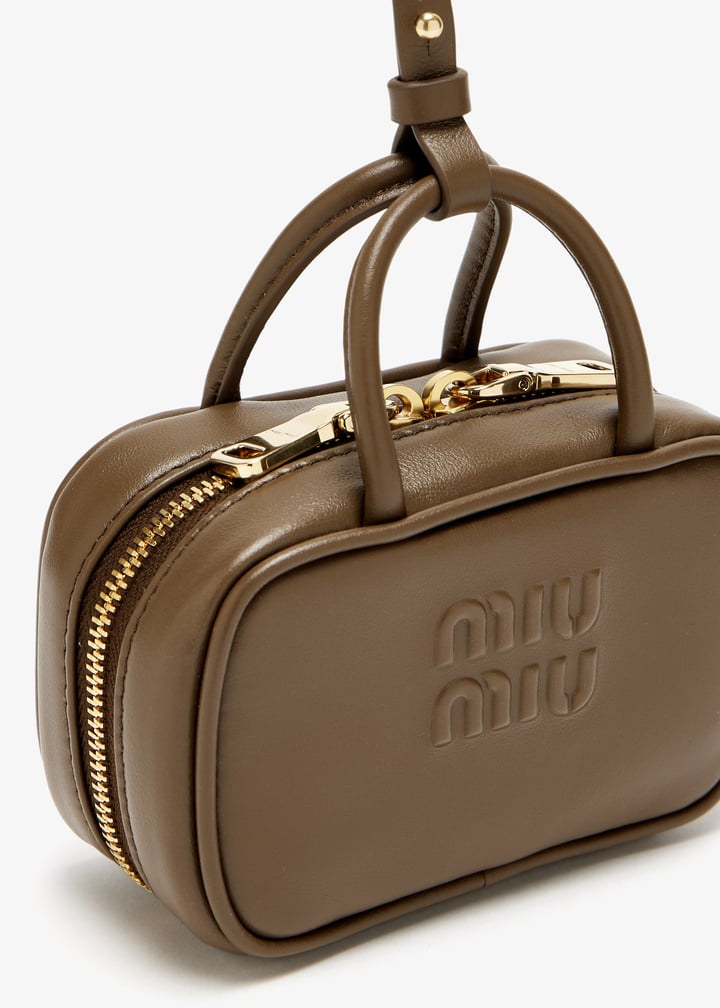 Miu Miu Leather bag charm trick for Women - Brown in UAE