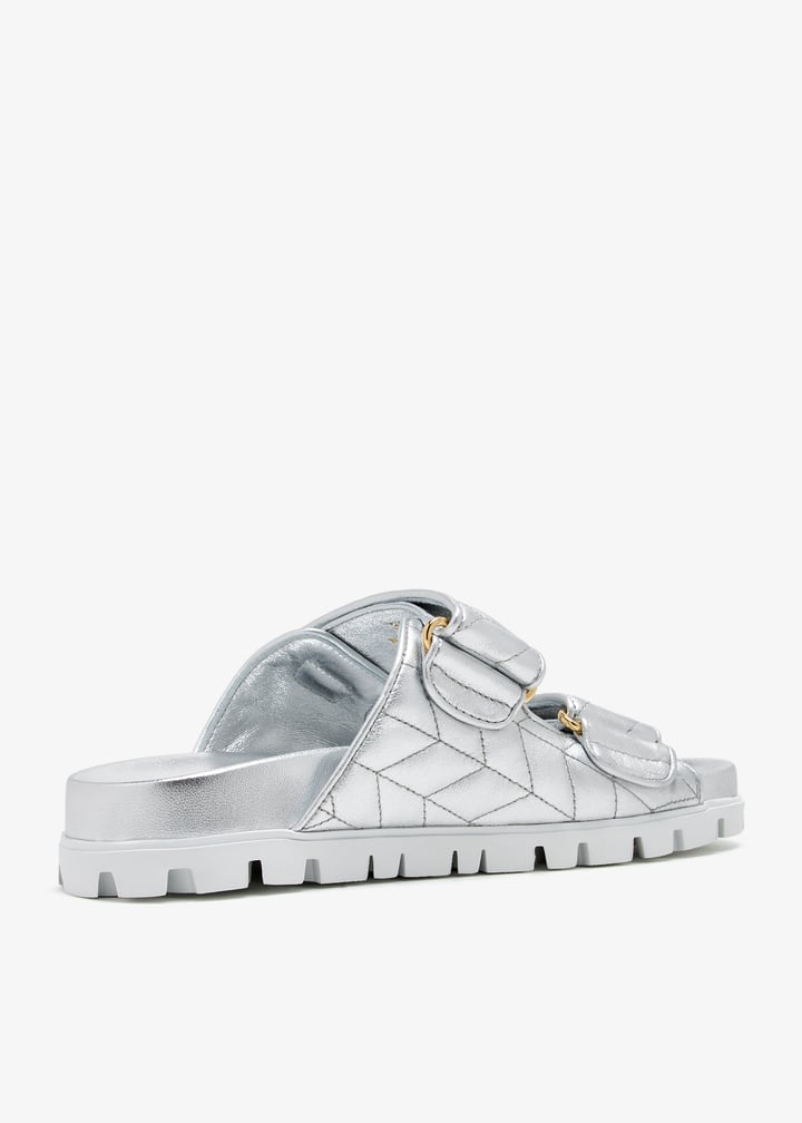 Miu Miu Metallic matelassé nappa leather slides for Women