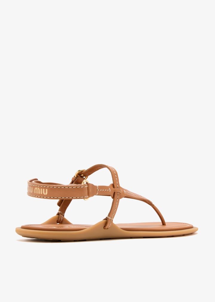 Miu Miu Leather thong sandals for Women - Brown in KSA | Level Shoes