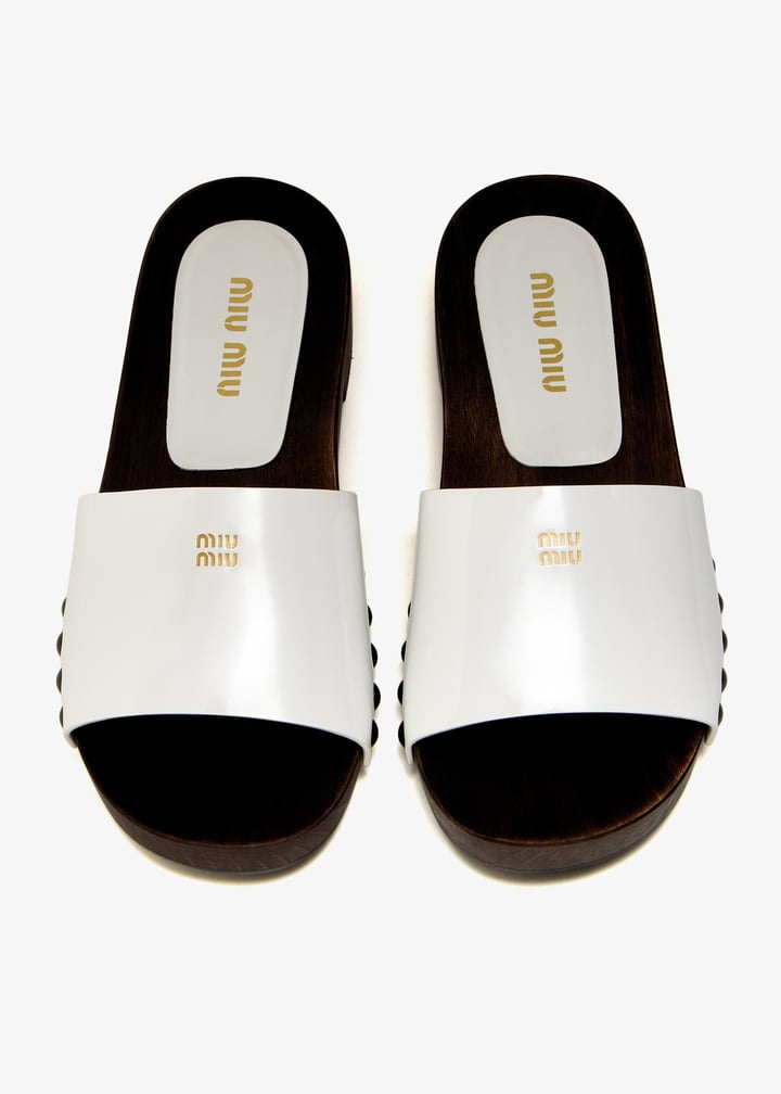 Miu Miu Patent leather clogs for Women - White in UAE