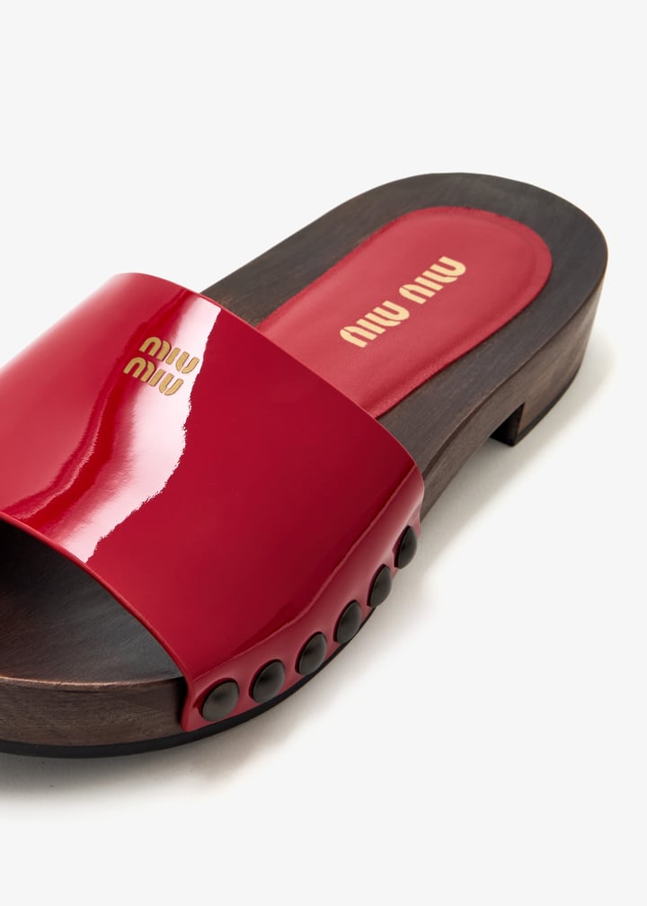 Miu Miu Patent leather clogs for Women - Red in UAE | Level