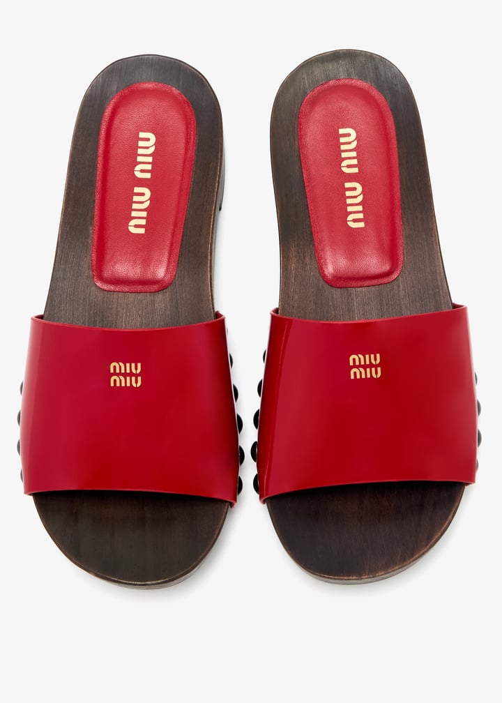 Miu Miu Patent leather clogs for Women - Red in UAE | Level