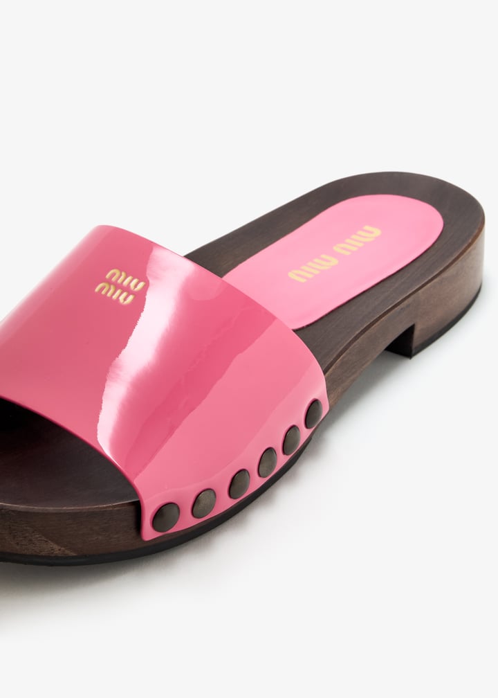 Miu Miu Patent leather clogs for Women - Pink in UAE | Level