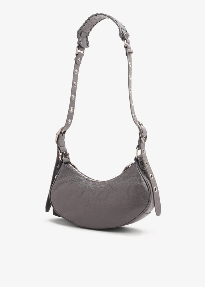 Balenciaga Le Cagole XS shoulder bag for Women - Grey in UAE Balenciaga Le Cagole XS shoulder bag for Women - Grey in UAE