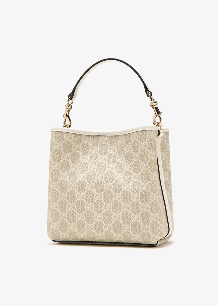 Gucci GG Emblem mini bucket bag for Women - Beige in UAE