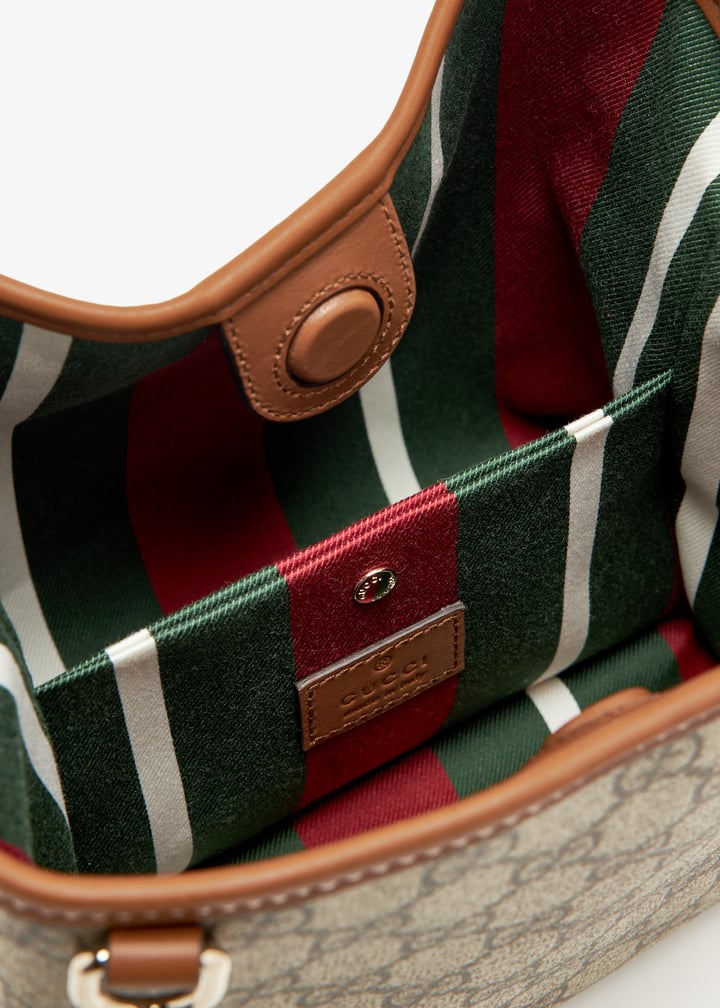 Gucci GG Emblem mini bucket bag for Women - Printed in UAE
