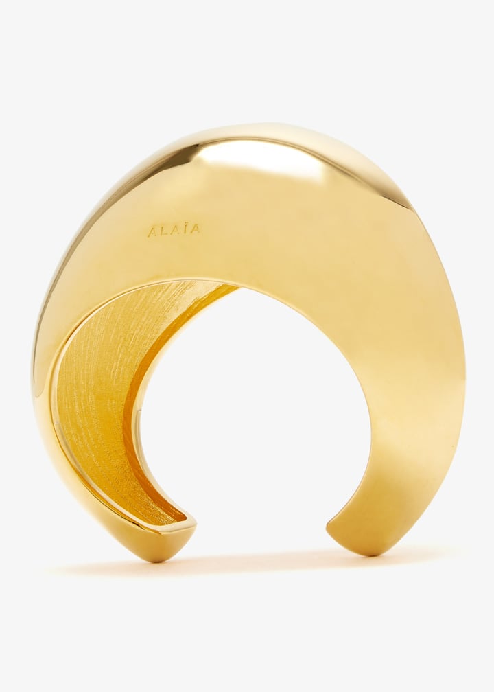 Alaïa Dome cuff for Women - Gold in UAE | Level Shoes
