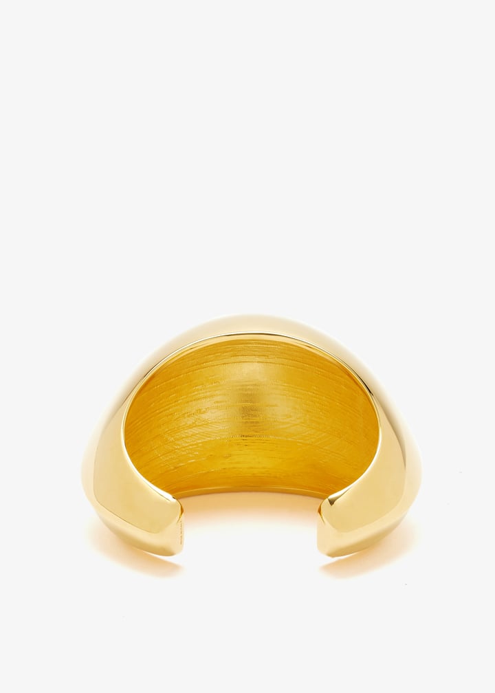 Alaïa Dome cuff for Women - Gold in UAE | Level Shoes
