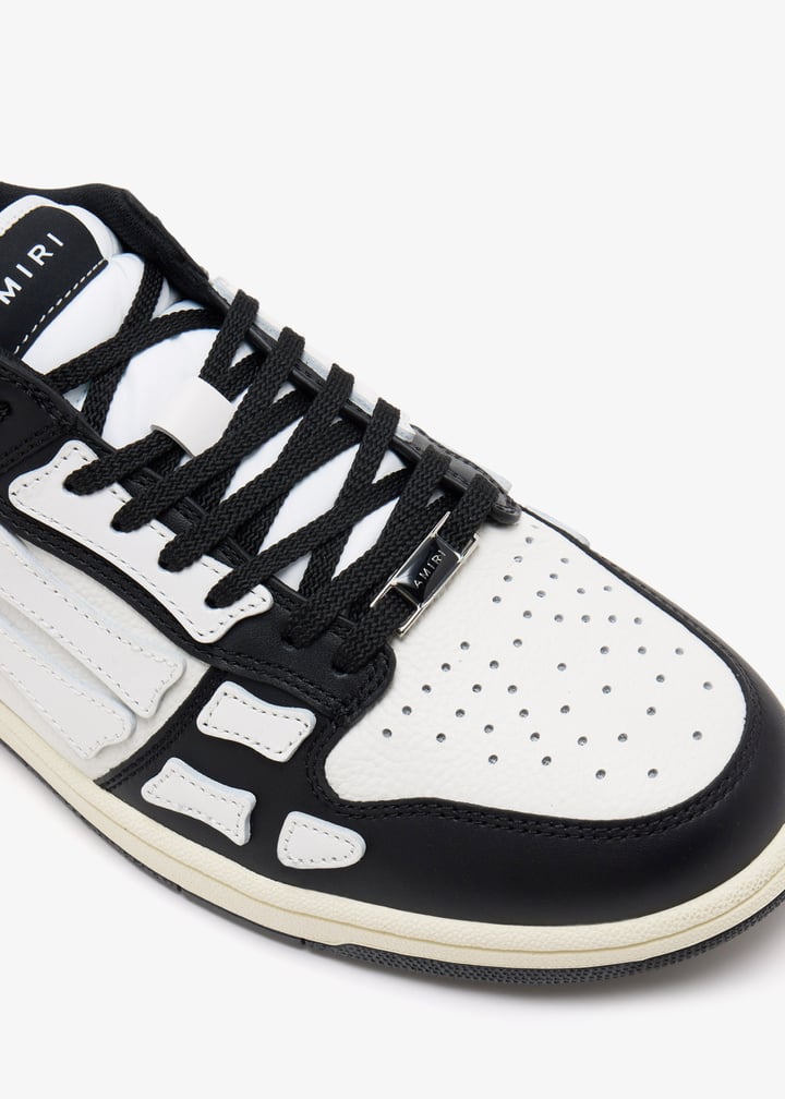 スニーカー AMIRI Men Sneakers AMFOSR1098 BLACK Black AMIRI Skel low-top sneakers for Men - Black in USA | Level Shoes