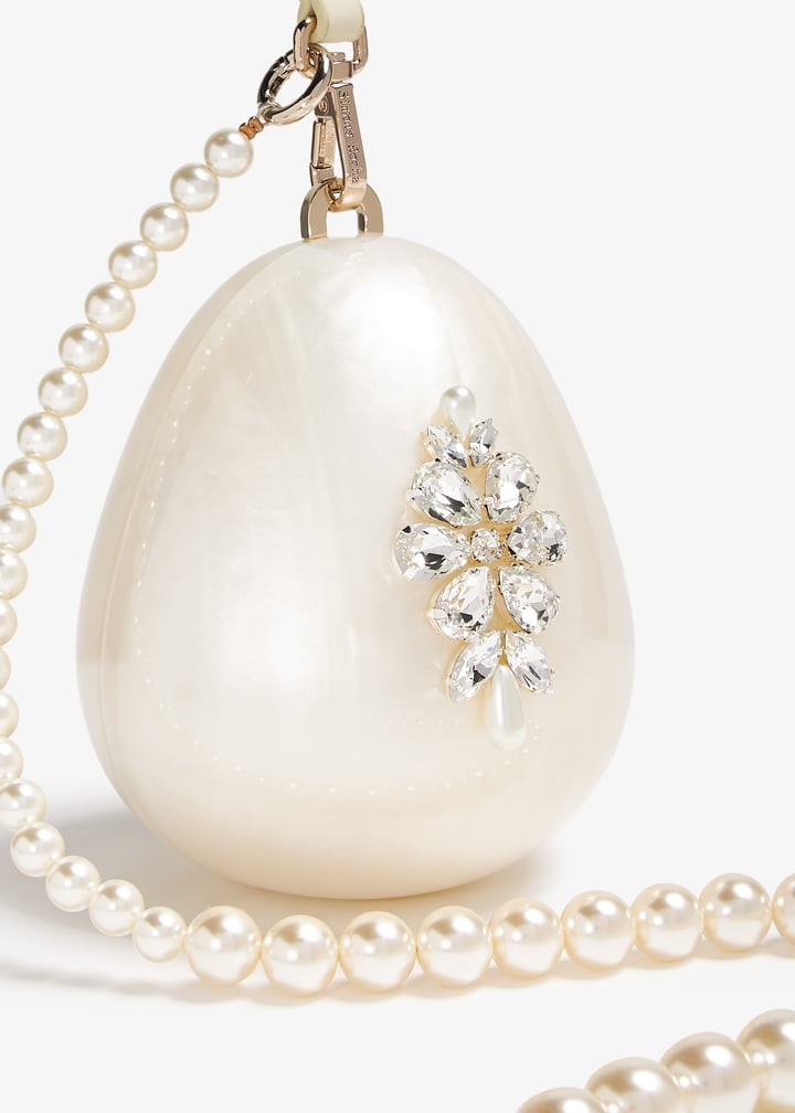 【SIMONE ROCHA】オフホワイト マイクロ Pearl Egg バッグ Simone Rochaのオフホワイト マイクロ Embellished Pearl Egg
