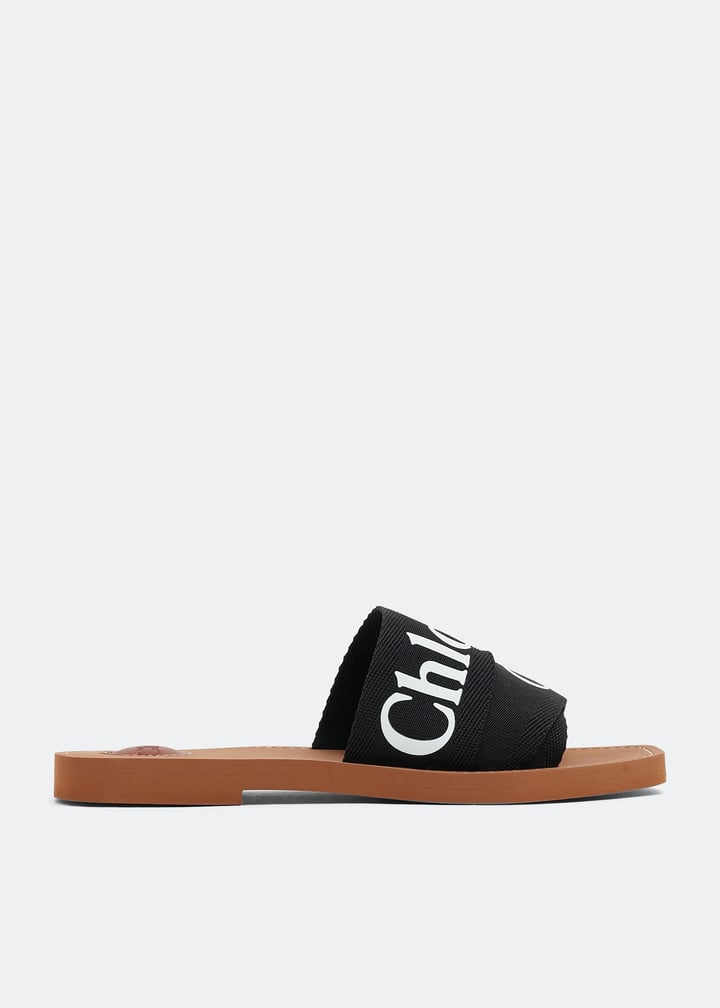 Chloé Woody flat sandals for Women - Black in UAE | Level Shoes