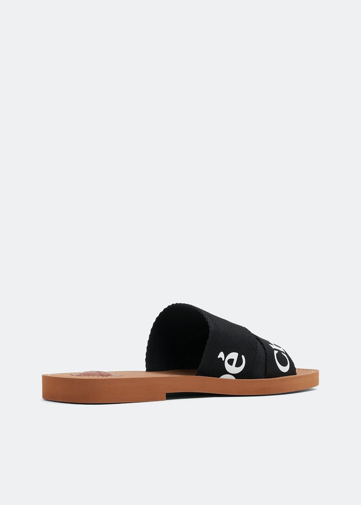 Chloé Woody flat sandals for Women - Black in UAE | Level Shoes