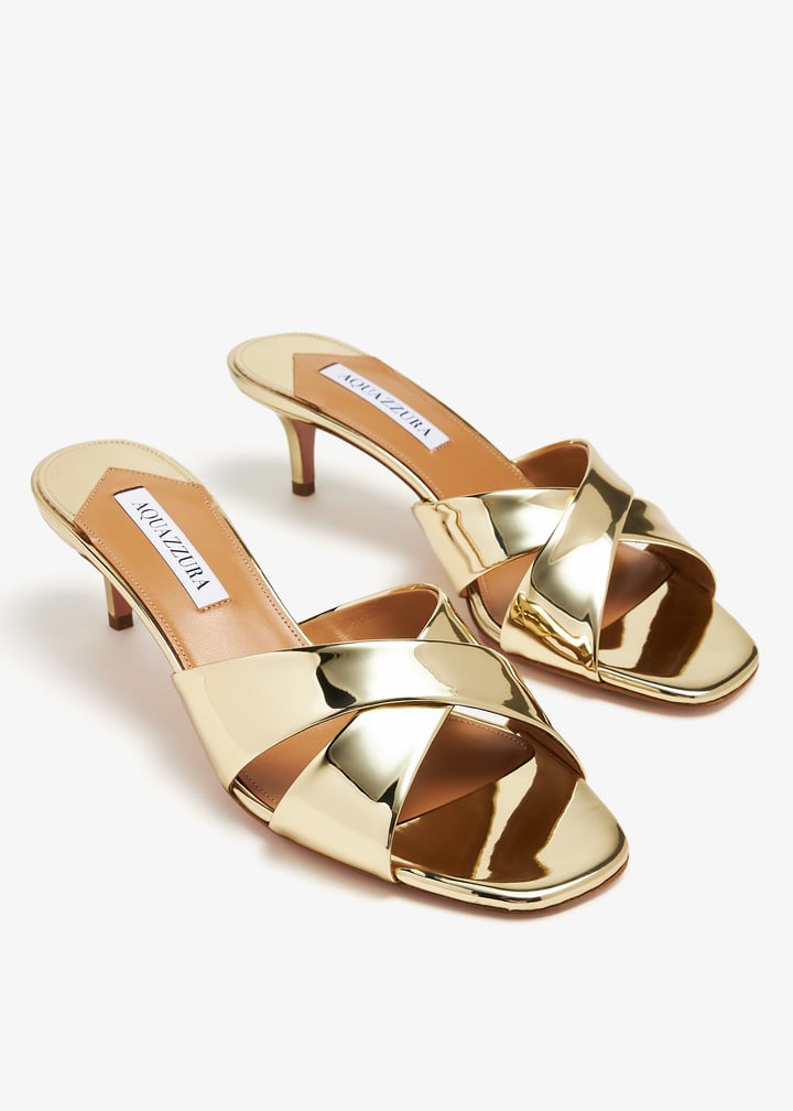 Aquazzura Divine 50 mules for Women - Gold in UAE | Level Shoes