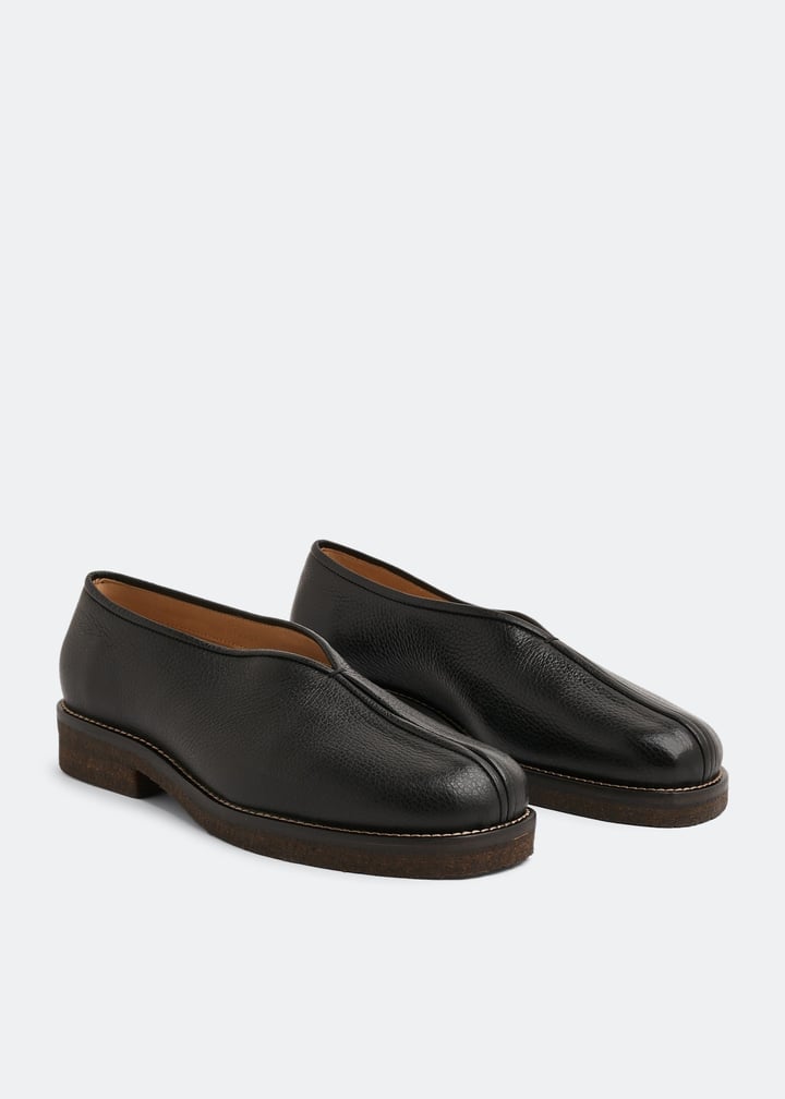 Lemaire Piped slippers for Men - Black in UAE | Level Shoes