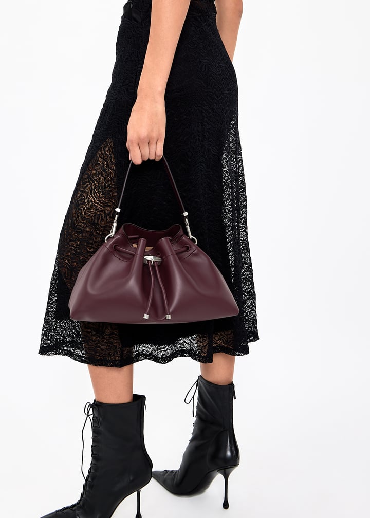 Jimmy Choo Cinch M bag for Women - Burgundy in UAE | Level Shoes