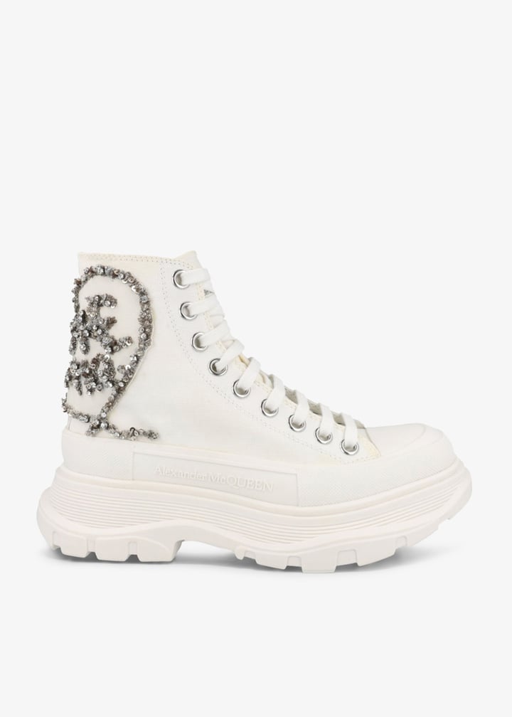 'Love Me' crystal-embellished tread boots