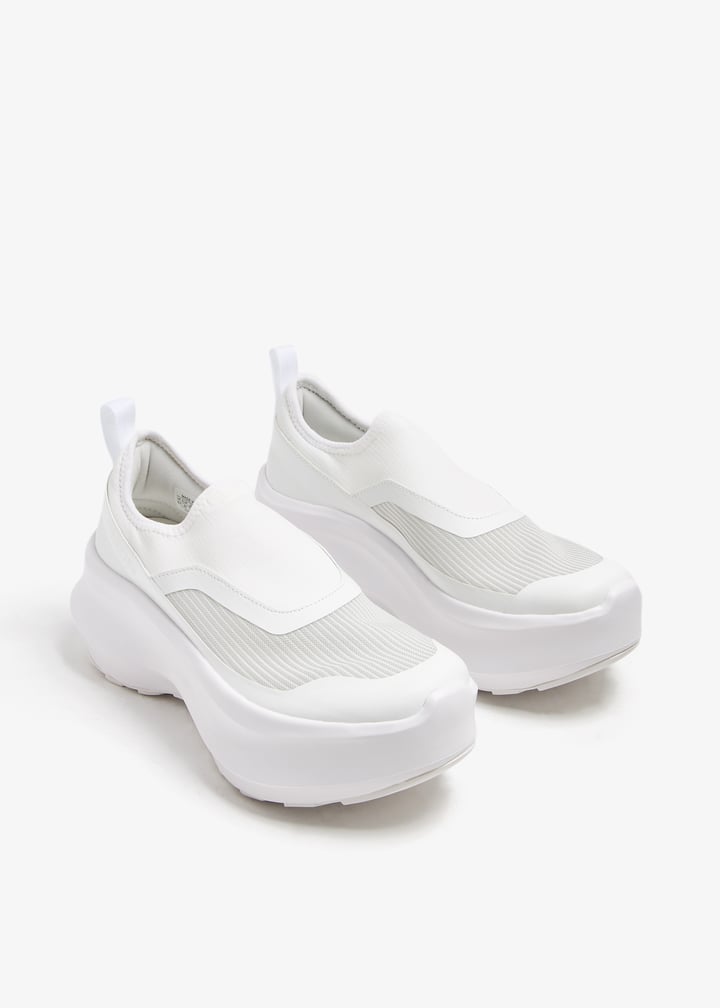Comme des Garçons x Salomon slip-on platform sneakers for